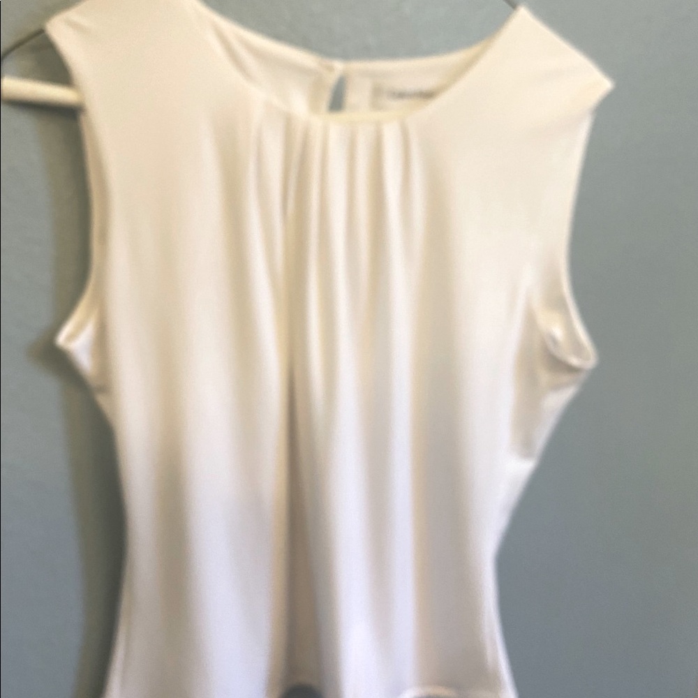 Calvin Klein sleeveless White shell. Polyester/spandex blend.